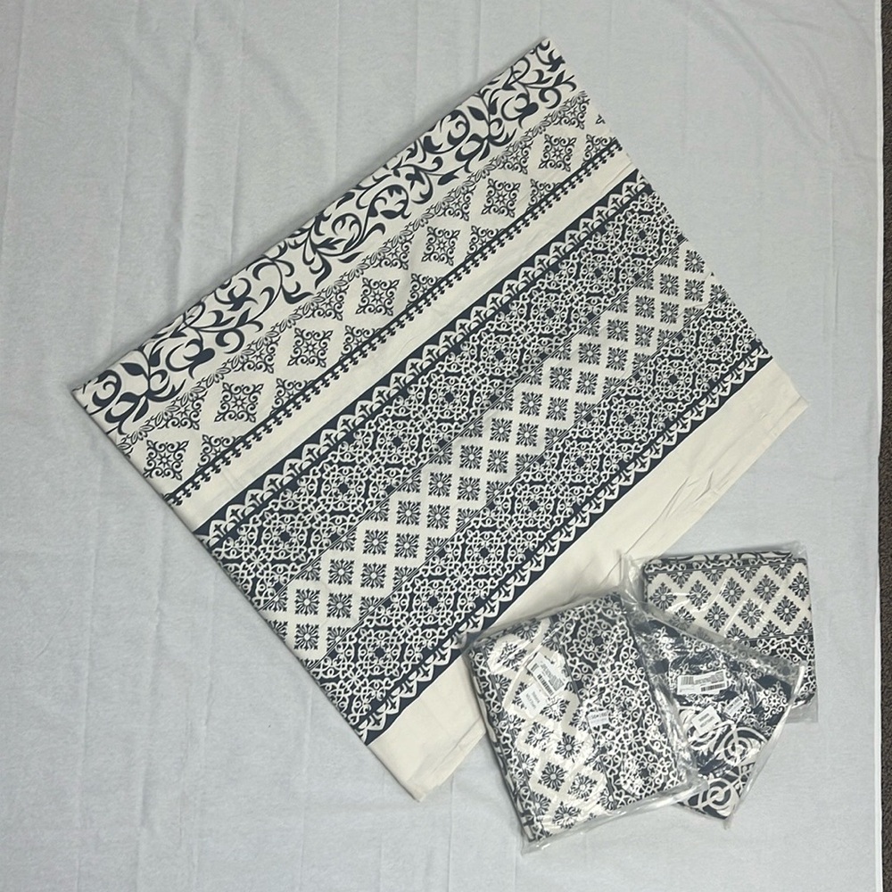 Navy blue and cream bohemian style curtains. Rod pocket, blackout. 4 panels..